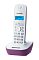 Фото-1 DECT-телефон Panasonic KX‑TG1611RU: трубка на базе-зарядке, вид спереди; белый корпус с фиолетовой боковой частью базы, синий подсвеченный дисплей, цифровая клавиатура и круглая навигационная кнопка; фото на белом фоне показывает внешний вид комплекта для страницы модели.
