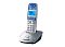 Фото-1 DECT‑телефон Panasonic KX‑TG2511RU: трубка на базе, ракурс 3/4; сине‑белая трубка, серебристая база, синяя подсветка дисплея, круглая навигация и цифровая клавиатура; на белом фоне — важно, чтобы увидеть сочетание цветов и элементы панели управления.
